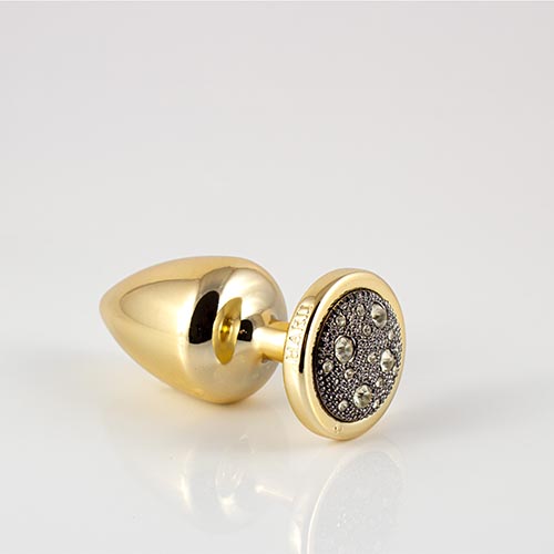 Plug LESS M (ABS) Dourado com Pedra Cravejada Onix