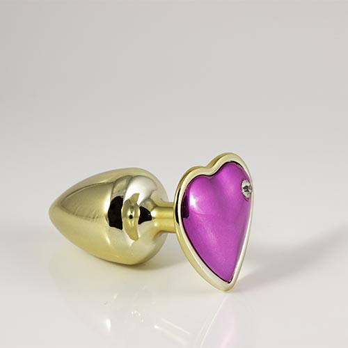 Plug Dourado Com Pedra De Coração Rosa