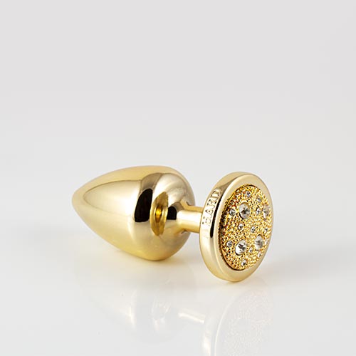 Plug LESS M (ABS) Dourado com Pedra Cravejada Dourada
