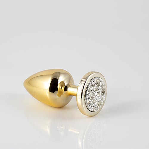 Plug LESS M (ABS) Dourado com Pedra Cravejada Prata